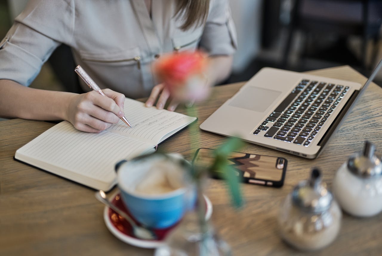Person writing a note