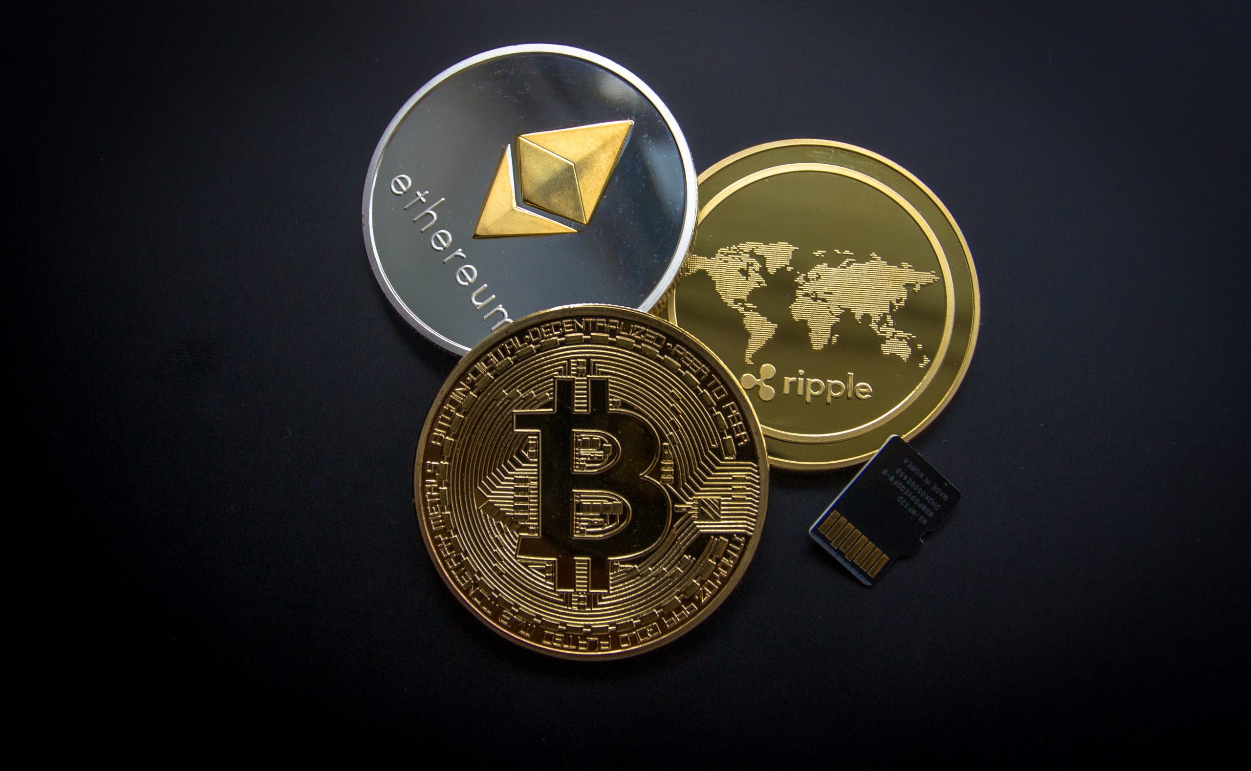 Ripple, Ethereum, Bitcoin and micro-SDHC card.